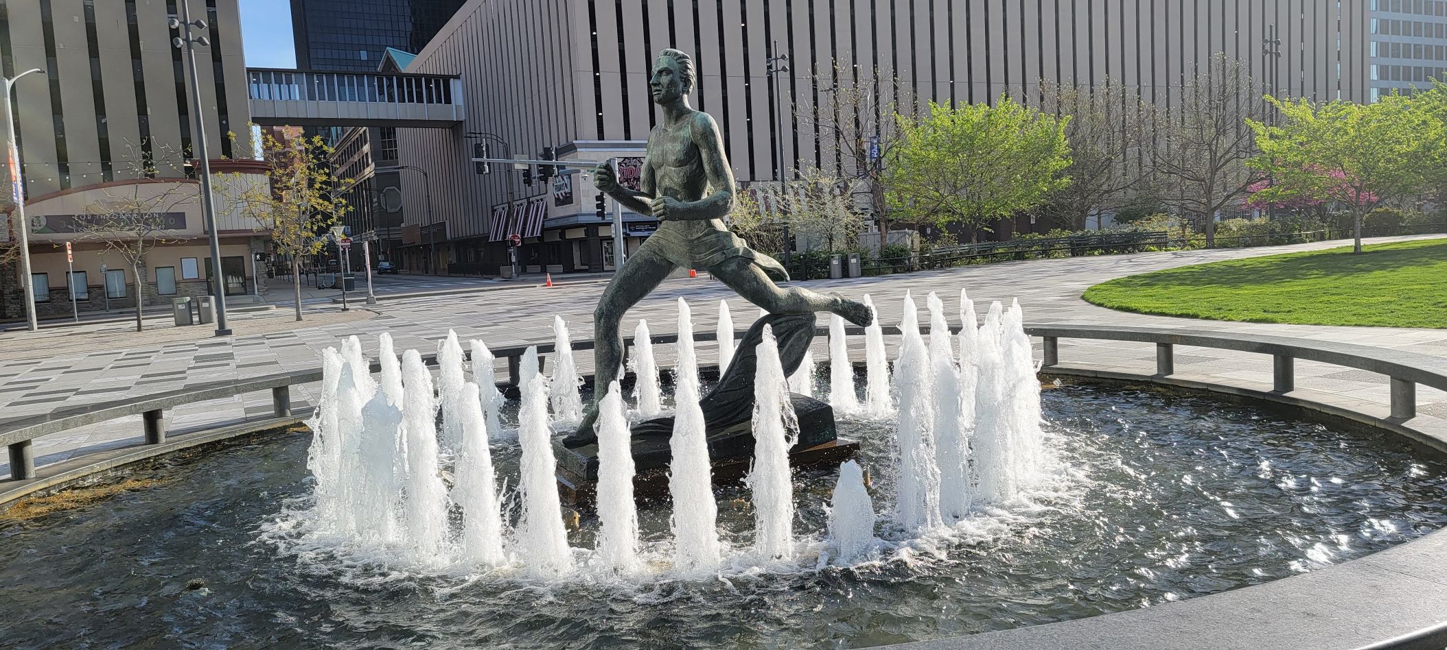 Running Man Statue In Fountain