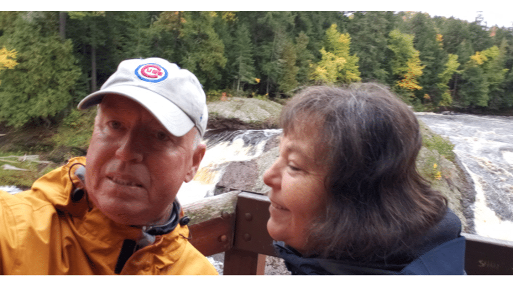 Couple looking at each other in front of rapids